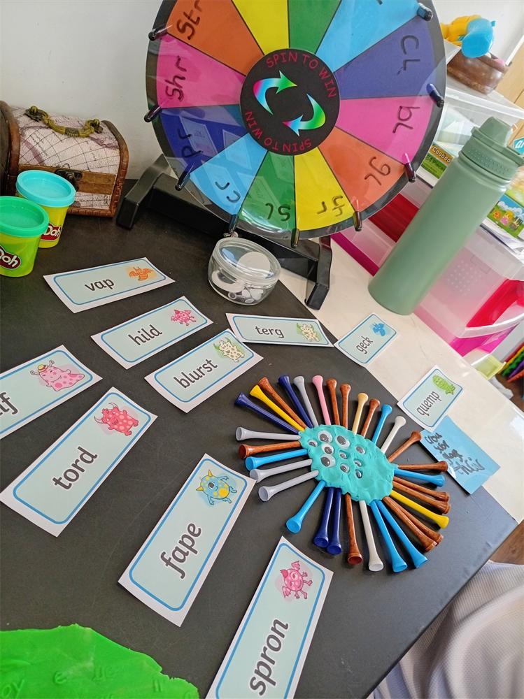 A pupil exploring a colourful counting activity