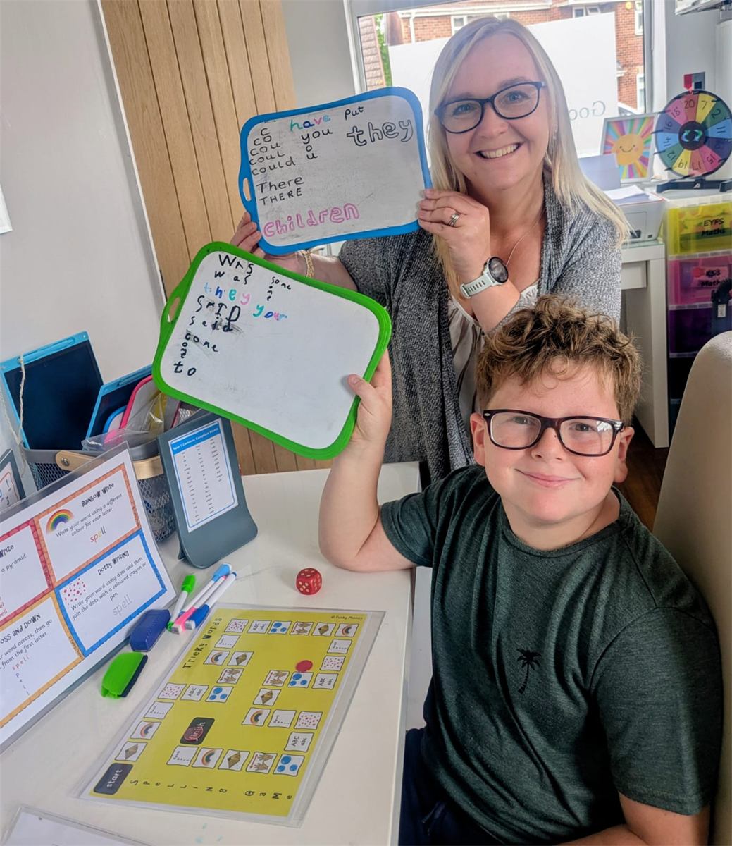 A pupil celebrating an achievement at The Curiosity Classroom